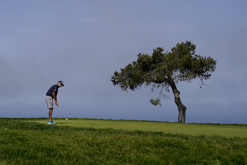 American Bubba Watson putts on the fifth green during a practice round this week in preparation for the U.S. Open, which begins today at Torrey Pines Golf Course in San Diego. An ongoing trend has more Opens being played on the West Coast.
(AP/Jae C. Hong)