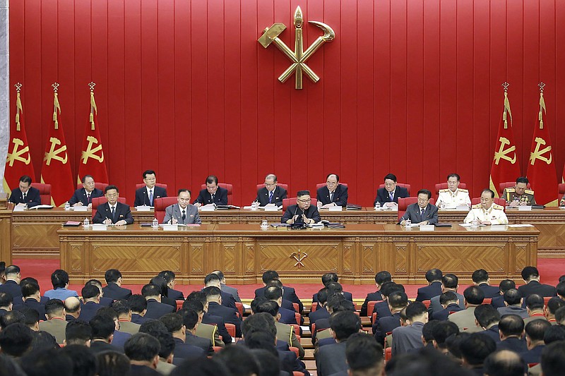 In this photo provided by the North Korean government, North Korean leader Kim Jong Un (center) speaks during a Workers’ Party meeting Tuesday in Pyongyang.
(AP/Korean Central News Agency/Korea News Service)
