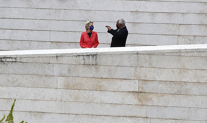 European Commission President Ursula von der Leyen walks with Portuguese Prime Minister Antonio Costa on Wednesday in Lisbon. Von der Leyen is touring some European Union capitals to endorse plans for EU coronavirus economic recovery funds.
(AP/Armando Franca)