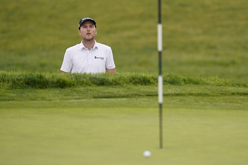 American Russell Henley shot a 4-under 67 on Thursday and holds the lead in the U.S. Open at Torrey Pines Golf Course in San Diego. Henley finished with six birdies and two bogeys. More photos available at arkansasonline.com/618open.
(AP/Gregory Bull)