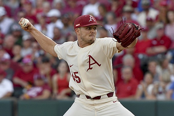 Arkansas Kevin Kopps (45) throws against North Carolina State during an NCAA college baseball super regional game Sunday, June 13, 2021, in Fayetteville. (AP Photo/Michael Woods)