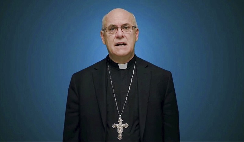 In this photo taken from video, Bishop Kevin Rhoades of Fort Wayne-South Bend, Ind., head of the doctrine committee for the U.S Conference of Catholic Bishops, addresses the body's virtual assembly regarding a formal statement on the meaning of the Eucharist in the life of the church on Thursday, June 17, 2021. (United States Conference of Catholic Bishops via AP)