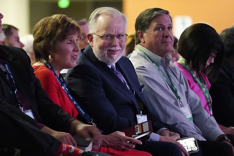 Pastor Ed Litton (center) of Saraland, Ala., attends the annual Southern Baptist Convention meeting Tuesday in Nashville, Tenn.
(AP/Mark Humphrey)