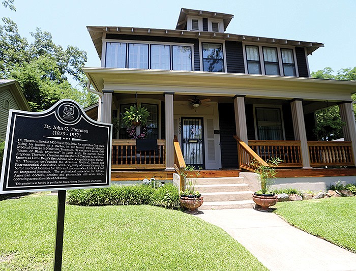 A new historical marker sits Wednesday on West 15th Street in Little Rock outside the former home of Dr. John Thornton, one of the state’s first Black doctors.
(Arkansas Democrat-Gazette/Thomas Metthe)