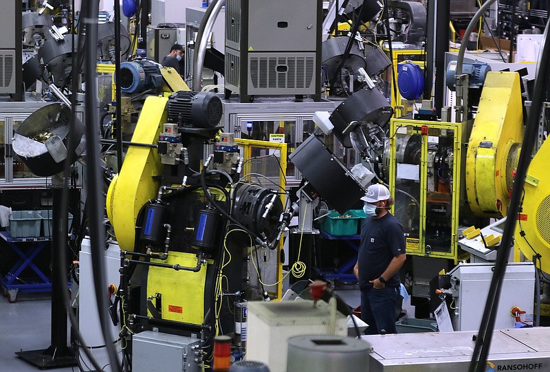 Sig Sauer employees work at the company’s ammunition plant in Jacksonville. New Hampshire-based Sig Sauer, which makes firearms, ammunition and accessories, centralized its ammunition production in Jacksonville in 2017.
(Arkansas Democrat-Gazette/Thomas Metthe)