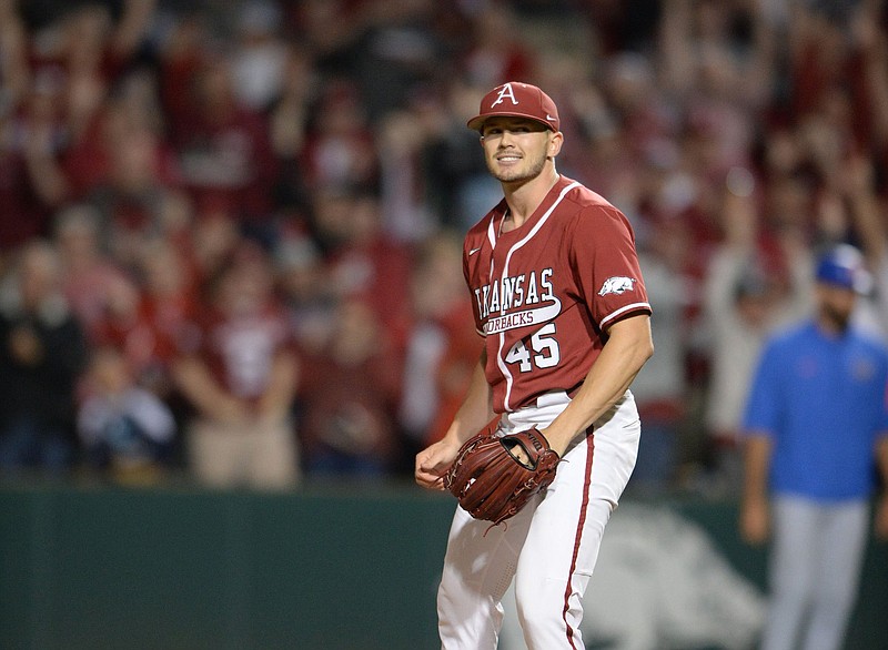 Arkansas reliever Kevin Kopps celebrates Friday, May 21, 2021, after the final out of the top of the ninth inning of play against Florida at Baum-Walker Stadium in Fayetteville. 
(NWA Democrat-Gazette/Andy Shupe)