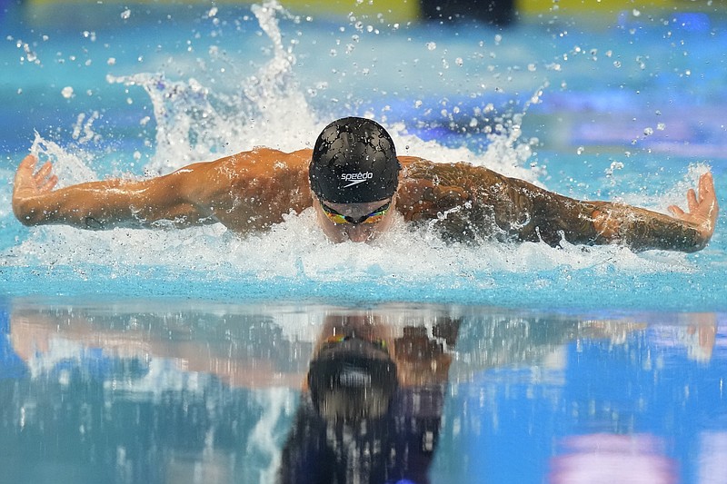 Caeleb Dressel won the men’s 100 butterfly in 49.87 during the U.S. Olympic Swim Trials on Saturday in Omaha, Neb. More photos at arkansasonline.com/620trials/
(AP/Charlie Neibergall)