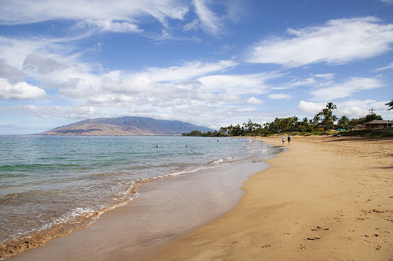 A few people enjoy Kamaole Beach Park 1 in Kihei, Hawaii, in August of 2020.
(Bloomberg (WPNS)/Mia Shimabuku)