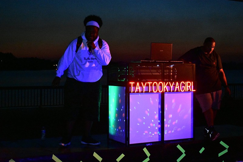 DJ Tay B of Pine Bluff entertains visitors at Saracen Landing. 
(Pine Bluff Commercial/I.C. Murrell)