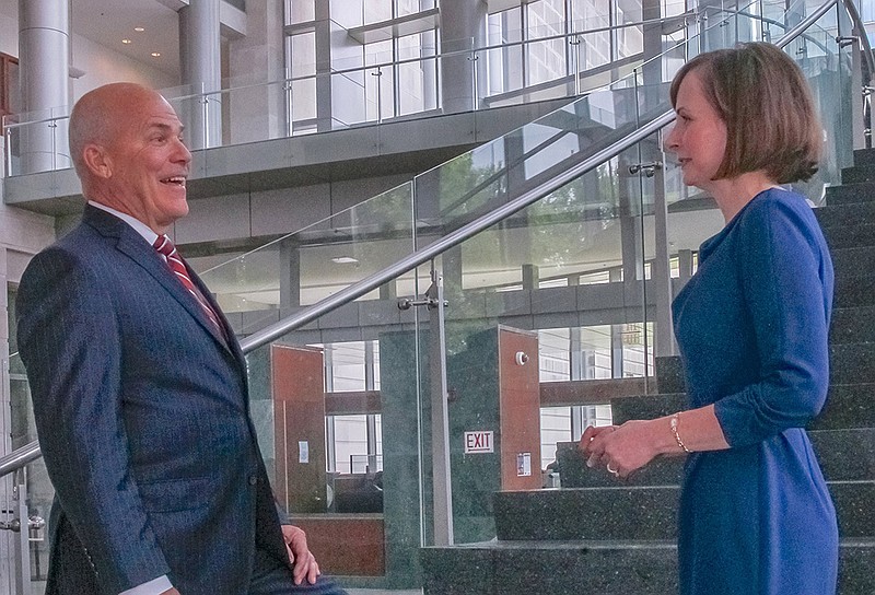 Federal court clerk James W. McCormack visits with Tammy Downs, his longtime chief deputy court clerk, at the federal courthouse in Little Rock. Downs was recently named to succeed McCormack, who is leaving after nearly 28 years.
(Arkansas Democrat-Gazette/Dale Ellis)