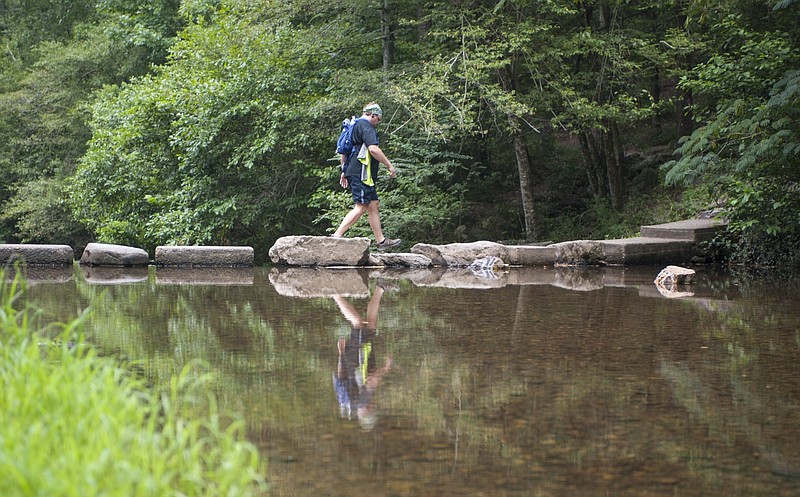 Brian Neal starts his hike on the Gulpha Gorge Trail in Hot Springs National Park in this Aug. 2, 2019, file photo. (Arkansas Democrat-Gazette file photo)