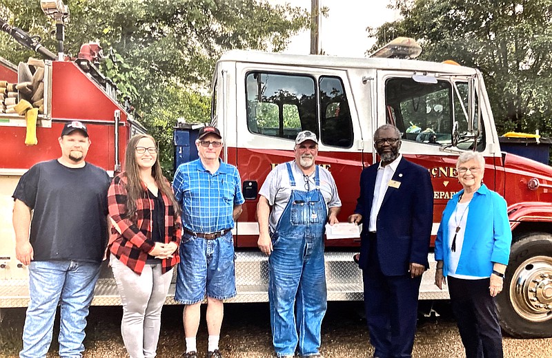 Rep. David Fielding, Mayor Terrie Triplet, SWAPD Rep Florence Nunn, Assistant Fire Chief Terry Price, Rick Muncrief and Tim Wood.
