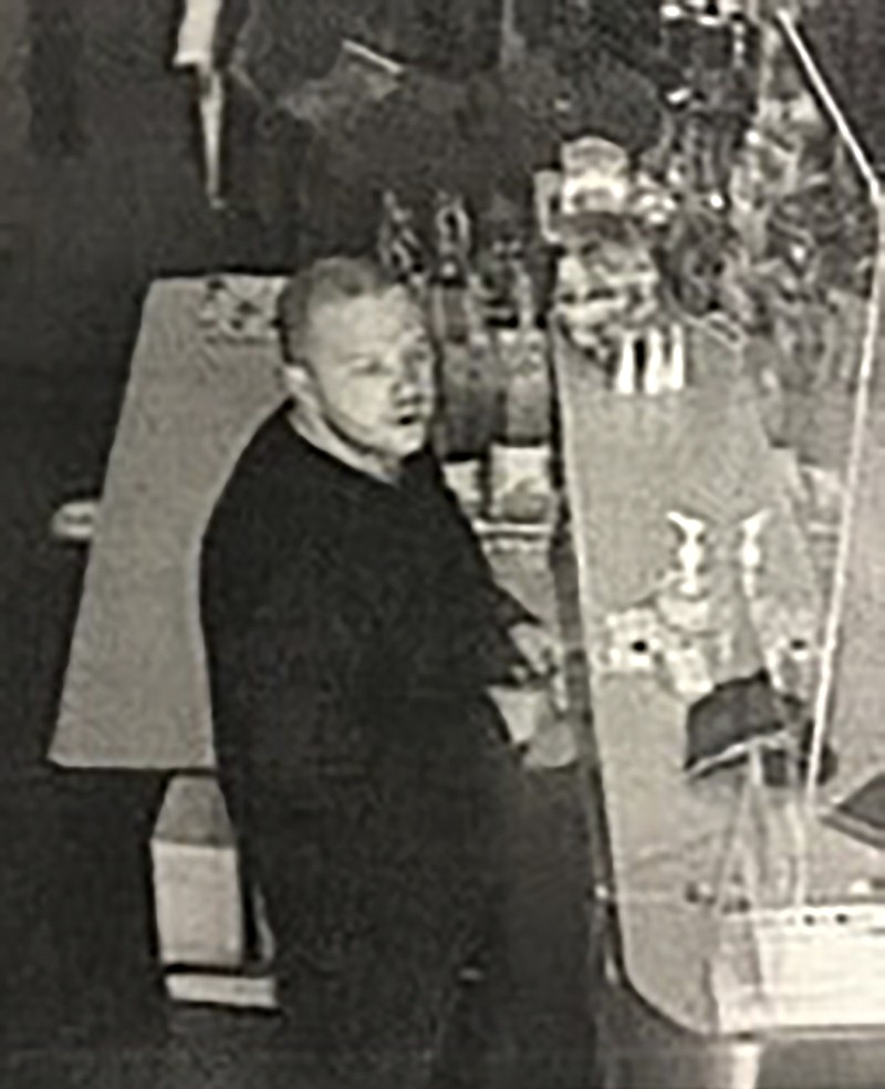 This security camera image provided by the Lane County Sheriff’s Department released Friday, June 18, 2021 shows a suspect in a hit-and-run crash and shootings in the small city of Noti, in southwest Oregon that left three people dead. Authorities are seeking the publics help in finding and identifying the suspect. (Lane County Sheriff’s Department via AP)