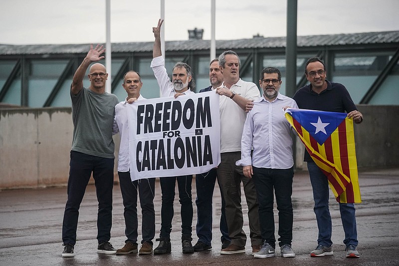 Catalan leaders imprisoned for their role in the 2017 push for an independent republic gather Wednesday outside Lledoners prison in Sant Joan de Vilatorrada near Barcelona, Spain.
(AP/Joan Mateu)