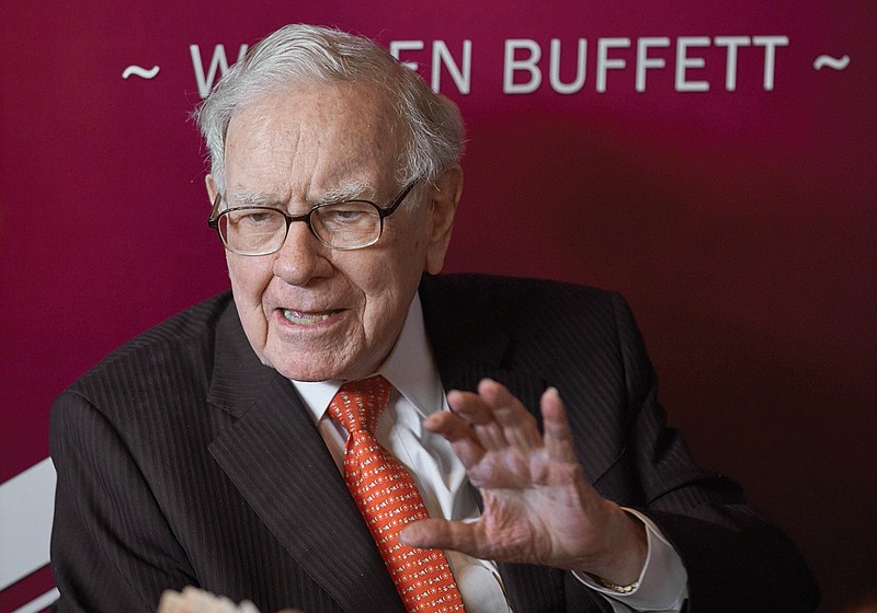 In this May 5, 2019, file photo Warren Buffett, Chairman and CEO of Berkshire Hathaway, speaks during a game of bridge following the annual Berkshire Hathaway shareholders meeting in Omaha, Neb. 
(AP Photo/Nati Harnik, File)