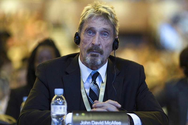 Software entrepreneur John McAfee, the creator of McAfee antivirus software, listens during the 4th China Internet Security Conference in Beijing in this Aug. 16, 2016, file photo. (AP/Ng Han Guan)