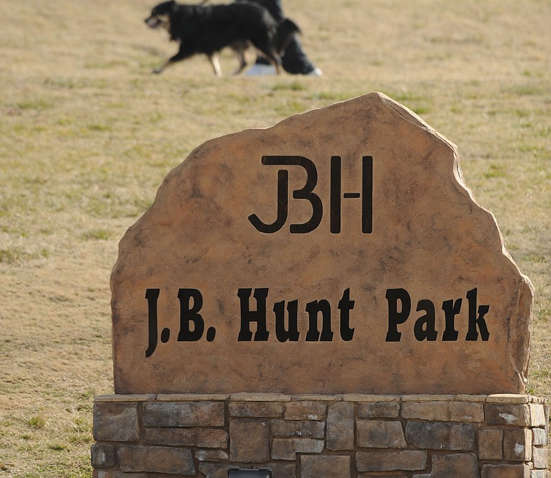 A dog walks along the trial at J.B. Hunt Park Sunday, March 3, 2013, in Springdale. (NWA Democrat-Gazette FILE PHOTO/ANDY SHUPE)