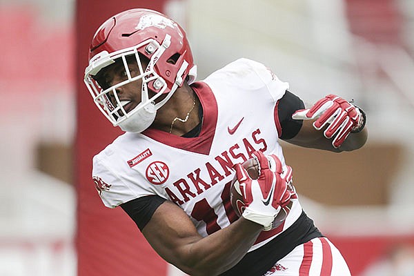 Arkansas receiver Treylon Burks catches a touchdown pass during the Razorbacks' Red-White spring game on Saturday, April 17, 2021, in Fayetteville.