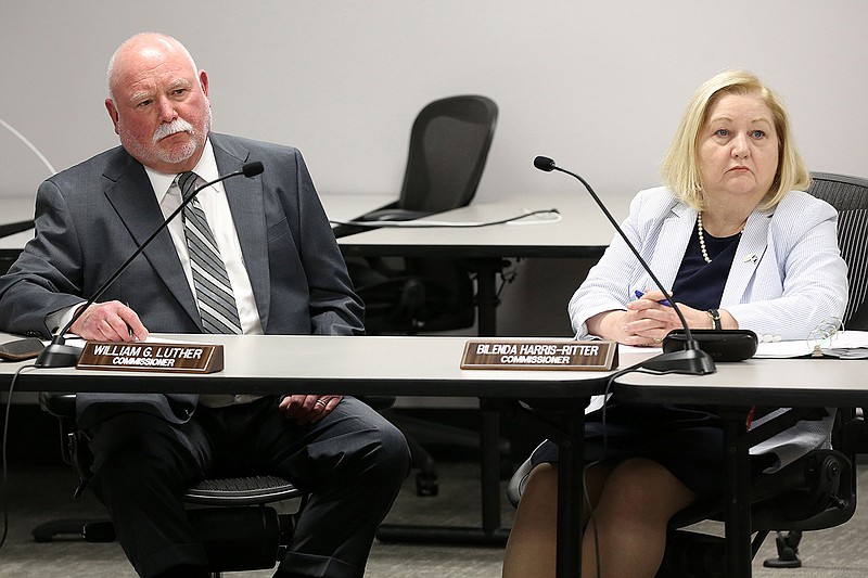 State Board of Election commissioners William Luther and Bilenda Harris-Ritter listen to opening statements Wednesday in Little Rock during a hearing over a complaint against Pulaski County Clerk Terri Hollingsworth.
(Arkansas Democrat-Gazette/Thomas Metthe)