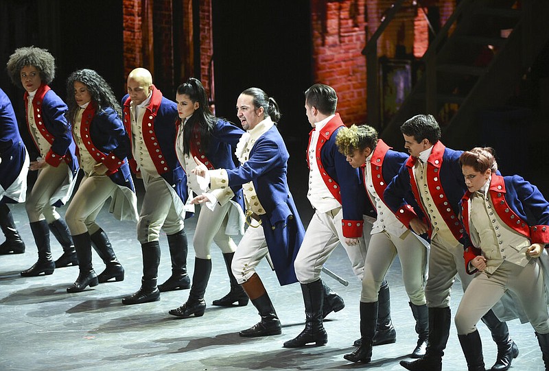 FILE - In this June 12, 2016 file photo, Lin-Manuel Miranda, center, and the cast of "Hamilton" perform at the Tony Awards in New York. (Photo by Evan Agostini/Invision/AP, File)