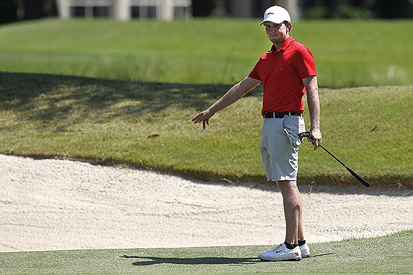 Luke Long of Fayetteville directs his putt on the 13th green during the first round of the Southern Amateur Championship on Wednesday, July 17, 2019, at Chenal Country Club in Little Rock.