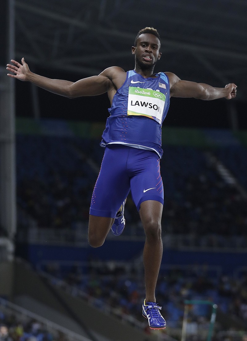 United States' Jarrion Lawson competes in a qualifying round of the men's long jump during the athletics competitions of the Summer Olympics in Rio de Janeiro, Brazil, Friday, Aug. 12, 2016. (AP Photo/Matt Slocum)