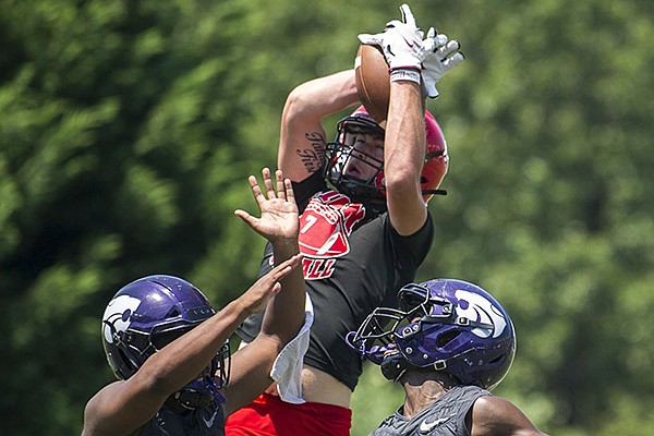 Dax Courtney, from Clarendon, plays in a 7-on-7 event at Pulaski Academy High School on Friday, June 18, 2021, in Little Rock.