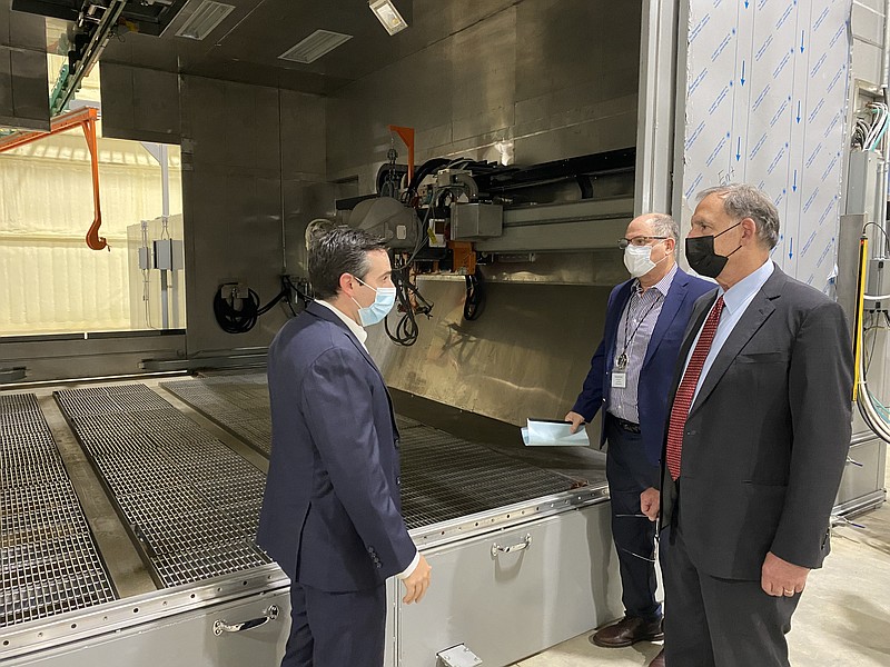 Senator John Boozman stands beside Amfuel President Michael Accordino during a tour of the company’s facilities. (Rhett Gentry/Banner-News)