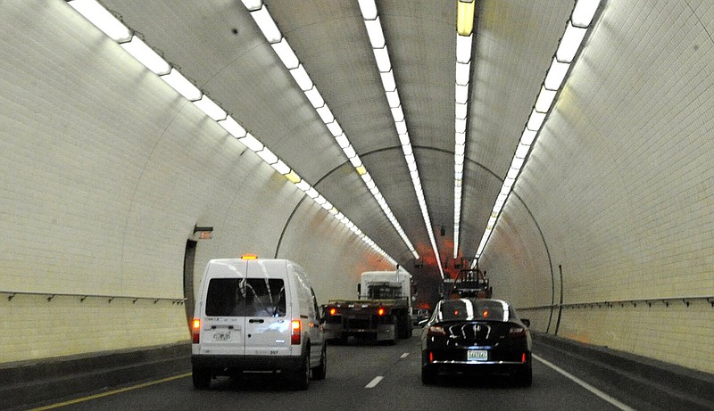 Traffic crawls through the Wallace Tunnel on I-10 beneath the Mobile River in Mobile, Ala., in 2014. Traffic commonly backs up for miles on I-10 through Mobile at the height of tourist season.
(AP)