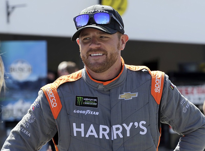 In this Saturday, Feb. 17, 2018, file photo, Justin Marks walks through the garage during practice for the NASCAR Daytona 500 Cup Series auto race at Daytona International Speedway in Daytona Beach, Fla. 
(AP Photo/Terry Renna, File)