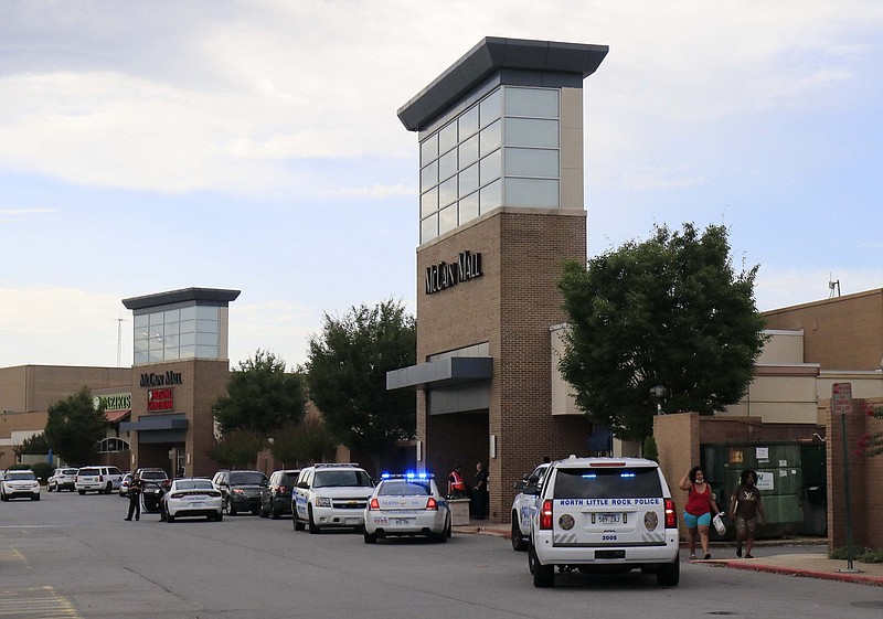 Police stand outside McCain Mall in North Little Rock in this Aug. 31, 2020, file photo. (Arkansas Democrat-Gazette/Staton Breidenthal)