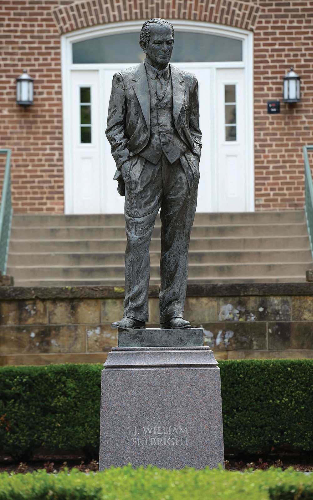 The future of a statue of J. William Fulbright, which stands near the west entrance of Old Main on the University of Arkansas campus in Fayetteville, is being debated because of the former university president and U.S. senator’s opposition to civil rights.
(NWA Democrat-Gazette/Andy Shupe)