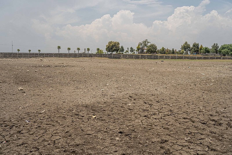 Dried land near the Villa Victoria Dam, the main water supply for Mexico City in Villa Victoria, Mexico, in early May.
(Bloomberg (WPNS)/Alejandro Cegarra)