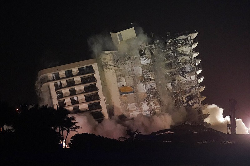 The damaged remaining structure at the Champlain Towers South condo building in Surfside, Fla., collapses in a controlled demolition on Sunday, July 4, 2021. (AP/Lynne Sladky)