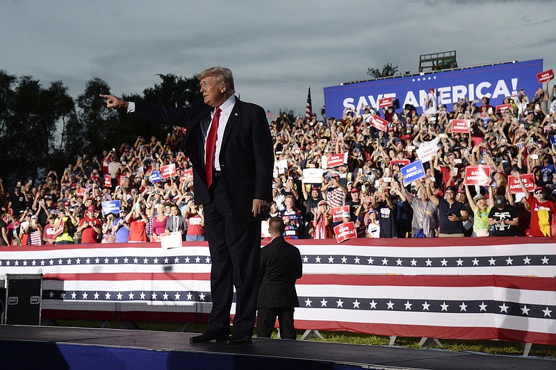 Former President Donald Trump walks on stage during a rally at the Sarasota Fairgrounds Saturday, July 3, 2021, in Sarasota, Fla. (AP/Jason Behnken)
