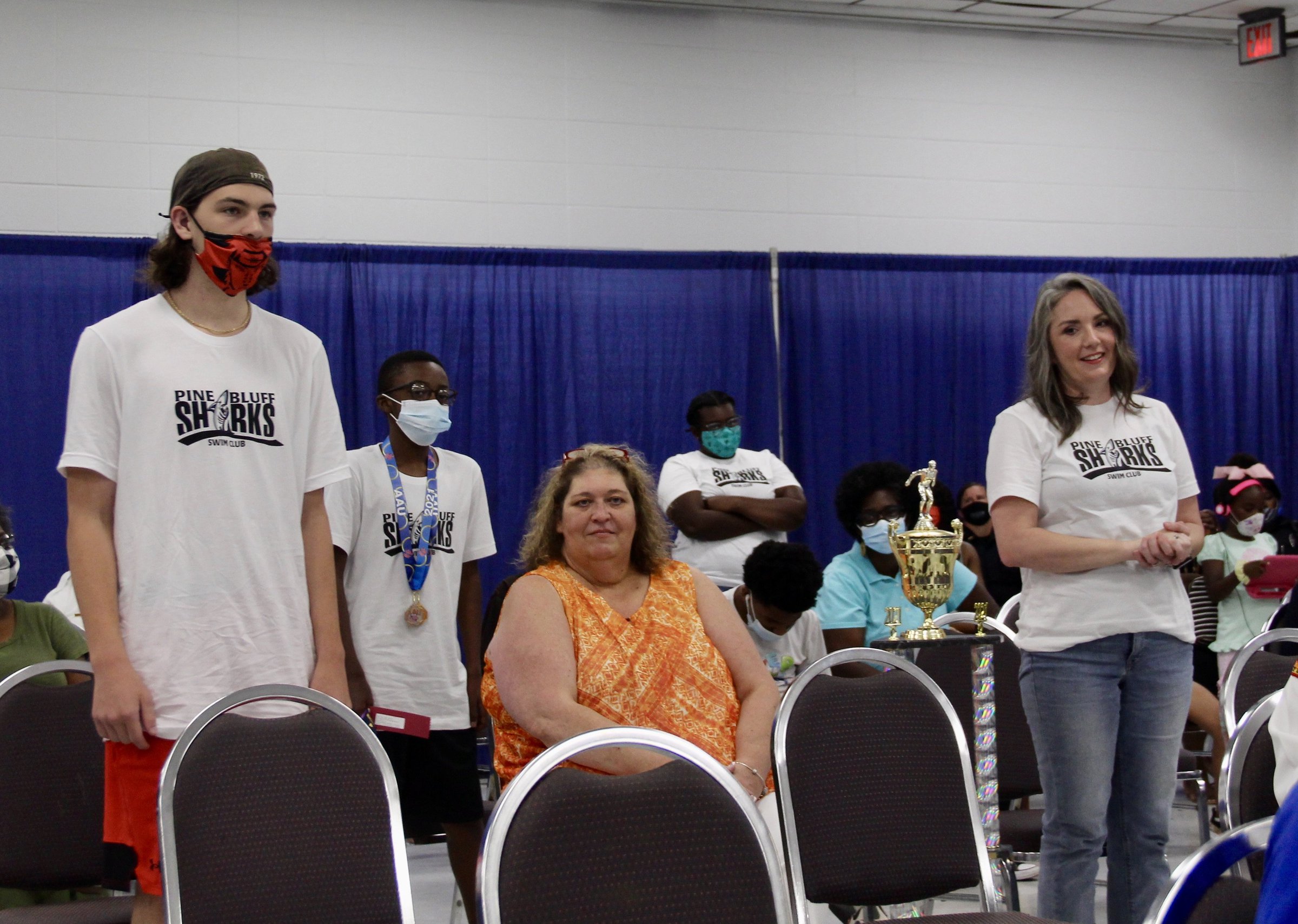 Mayor, council cheer Sharks swimmers