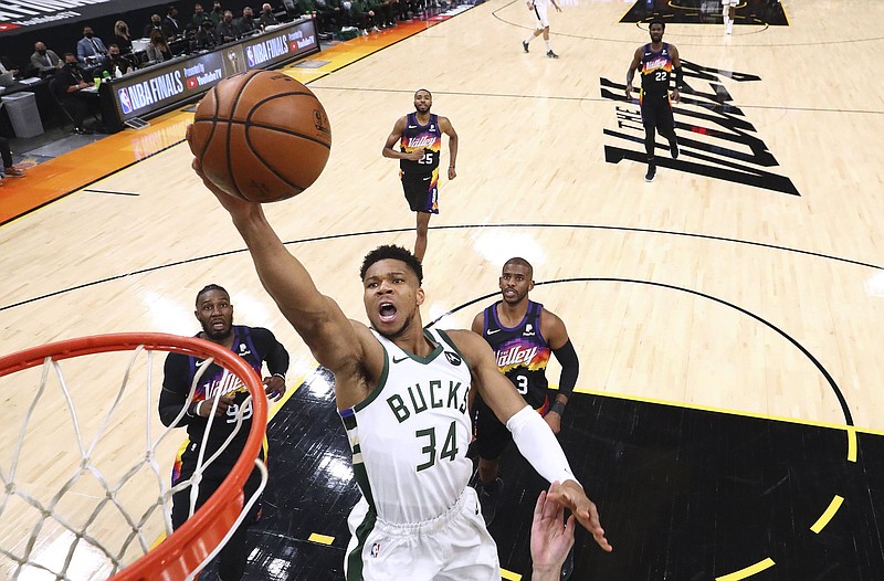 The Milwaukee Bucks’ transformation into an NBA title contender began in 2013 when they drafted Giannis Antetokounmpo (above) with the 15th overall pick and acquired Khris Middleton from the Detroit Pistons.
(AP/Mark J. Rebilas)