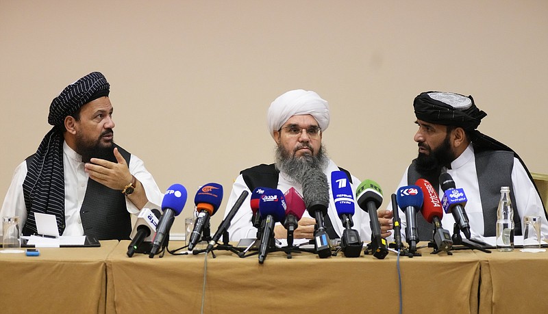 Mohammad Naim (from left), Mawlawi Shahabuddin Dilawar and Suhail Shaheen, members of a political  delegation from the Afghan Taliban’s movement, attend a news conference Friday in Moscow, Russia.
(AP/Alexander Zemlianichenko)