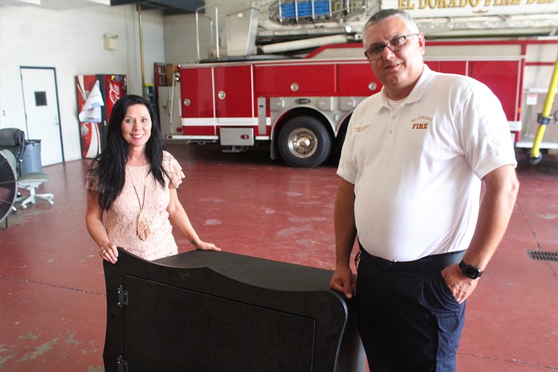 Hannah Pregnancy Center director Paula Williams and EFD Chief Chad Mosby stand with the Safe Haven Baby Box, which will soon be installed at EFD station 2. The box was delivered to the fire department last week and will be operational following installation and training. (Matt Hutcheson/News-Times)