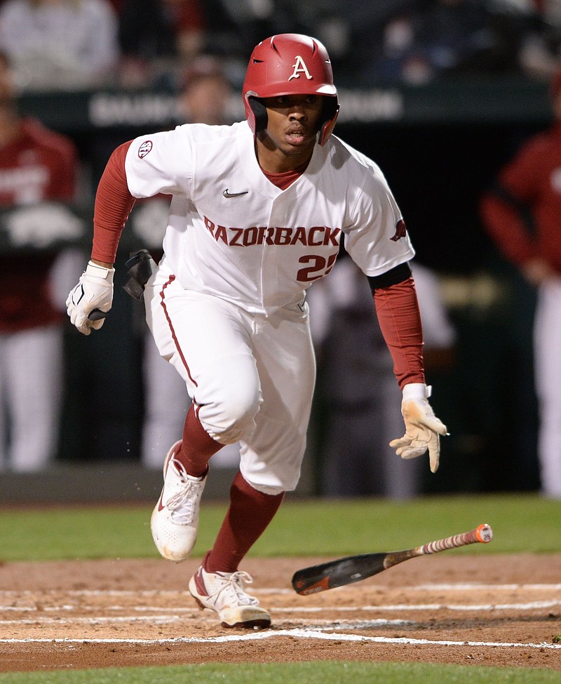 Arkansas center fielder Christian Franklin heads to first Friday, May 7, 2021, after hitting the ball during the second inning of play against Georgia at Baum-Walker Stadium in Fayetteville. Visit nwaonline.com/210508Daily/ for today's photo gallery. .(NWA Democrat-Gazette/Andy Shupe)