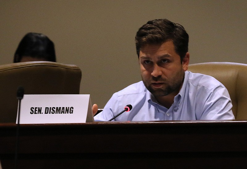 State Sen. Jonathan Dismang (top right), R-Beebe, is shown during a hearing of the Highway Commission Review and Advisory Subcommittee of the Arkansas Legislative Council at the state Capitol in Little Rock in this June 17, 2021, file photo. (Arkansas Democrat-Gazette/Thomas Metthe)