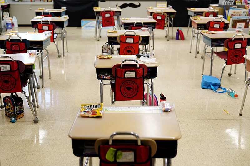 FILE - In this Thursday, March 11, 2021 file photo, desks are arranged in a classroom at an elementary school in Nesquehoning, Pa. (AP/Matt Slocum, File)