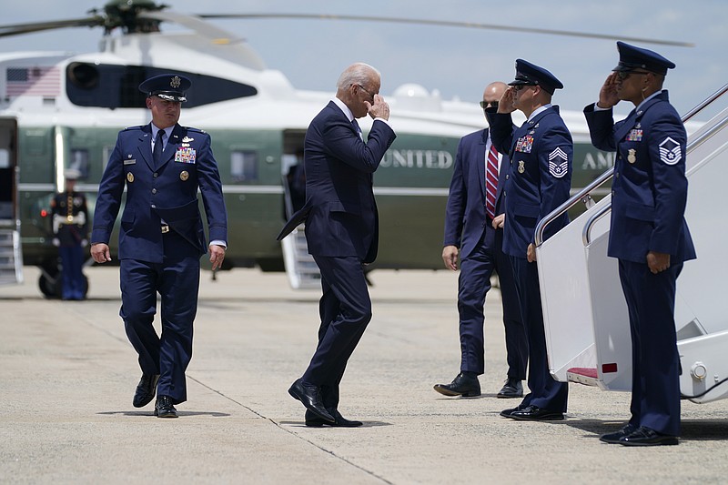 President Joe Biden salutes before boarding Air Force One for a trip to Philadelphia to deliver remarks on voting rights, Tuesday, July 13, 2021, in Andrews Air Force Base, Md. (AP Photo/Evan Vucci)