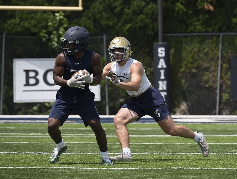 Shiloh Christian linebacker Kaden Henley (right), shown Wednesday against Little Rock Christian at the Southwest Elite 7-on-7 tournament in Springdale, has committed to play at the University of Arkansas.
(NWA Democrat-Gazette/Spencer Tirey)