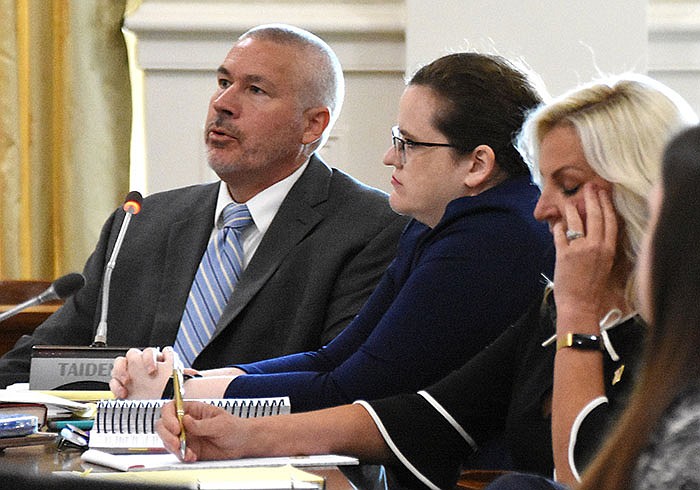 Attorney Dan Hancock represents Evelyn Gomez (second from left), Pulaski County Election Commission chairman, during the state Board of Election Commissioners hearing Wednesday at the state Capitol.
(Arkansas Democrat-Gazette/Staci Vandagriff)