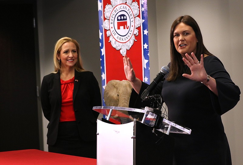 Sarah Huckabee Sanders (right) and Arkansas Attorney General Leslie Rutledge visit Republican Party headquarters in Little Rock in this Nov. 8, 2019, file photo. The two had submitted paperwork to put President Donald Trump’s name on the 2020 ballot in the state.