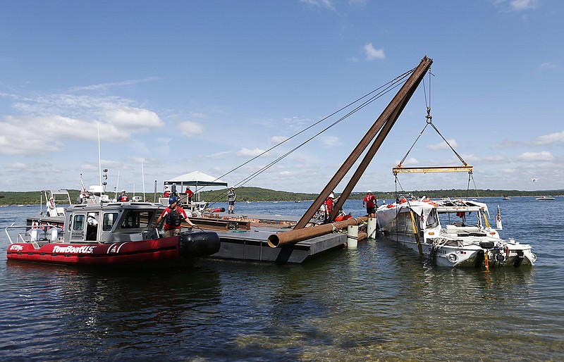 Seventeen people died on July 19, 2018, when a tourist duck boat sank at Table Rock Lake in Branson during a severe thunderstorm. Workers raised the sunken boat four days later. Victims included people from Arkansas, Illinois, Indiana and Missouri.
(AP file photo)