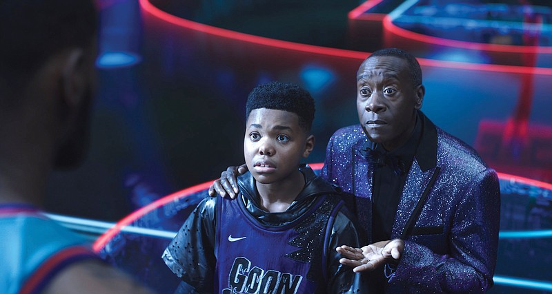 Video game whiz Dom (Cedric Joe) is stuck in a digital realm controlled by a rogue artificial intelligence unit known as Al G. Rhythm (Don Cheadle) in “Space Jam: A New Legacy.”