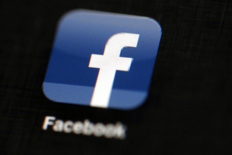 The Facebook logo is displayed on an iPad in Philadelphia in this May 16, 2012, file photo. (AP/Matt Rourke)