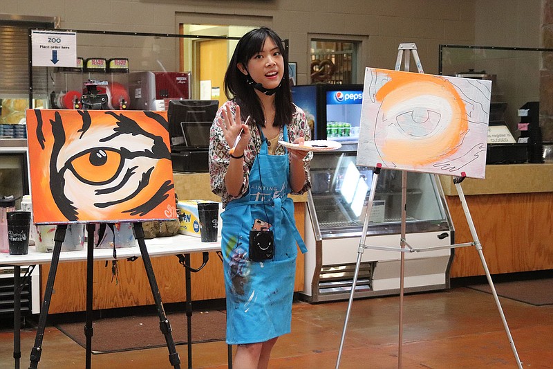 Madeline Burke of Painting With a Twist leads a class at Breakfast With a Twist Series-Tigers, held July 10, 2021, at the Little Rock Zoo.
(Arkansas Democrat-Gazette/Helaine R. Williams)